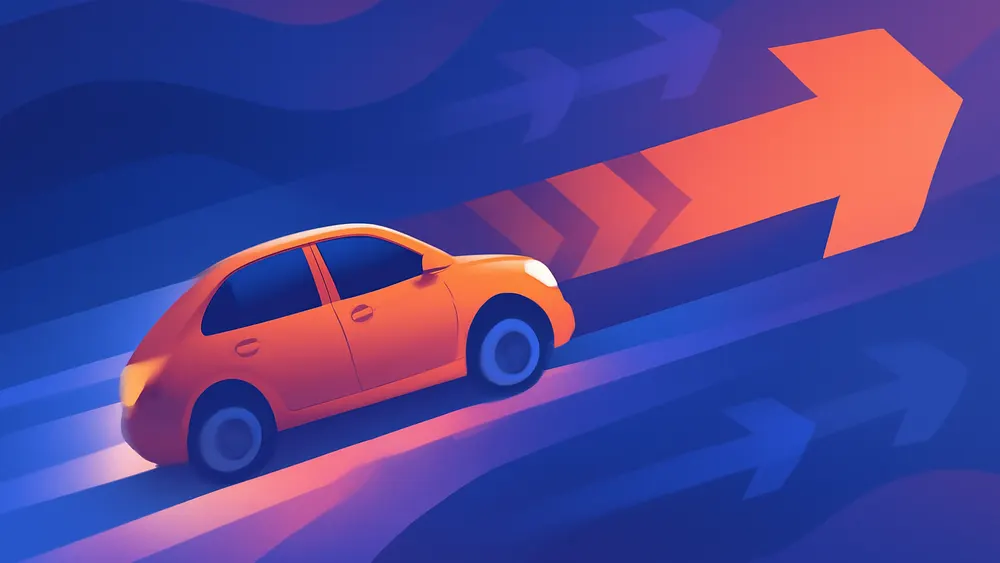 A car speeding up along a track with velocity arrows growing longer to show positive acceleration